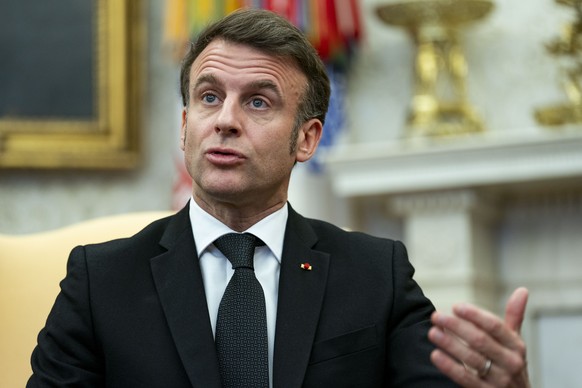 epa11922233 French President Emmanuel Macron speaks during a meeting with US President Donald Trump (not pictured) in the Oval Office of the White House in Washington, DC, USA, 24 February 2025. EPA/B ...
