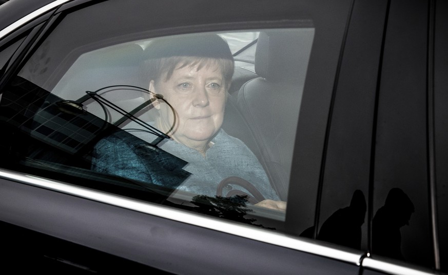 German Chancellor Angela Merkel arrives for a party meeting in Berlin Monday, June 25, 2018. (Michael Kappeler/dpa via AP)