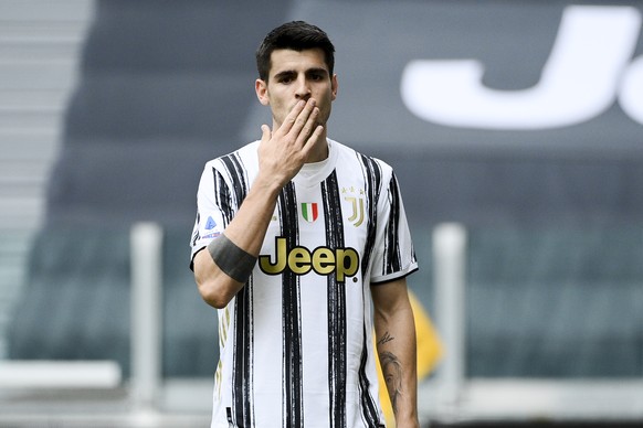Juventus&#039; Alvaro Morata celebrates after scoring his side&#039;s second goal during the Serie A soccer match between Juventus and Genoa, at the Turin Allianz stadium, Italy, Sunday, April 11, 202 ...