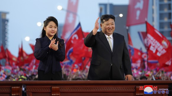 epa11341171 A photo released by the official North Korean Central News Agency (KCNA) shows North Korean leader Kim Jong Un (R) and his daughter Kim Ju-ae (L), attending the inauguration ceremony of Jo ...