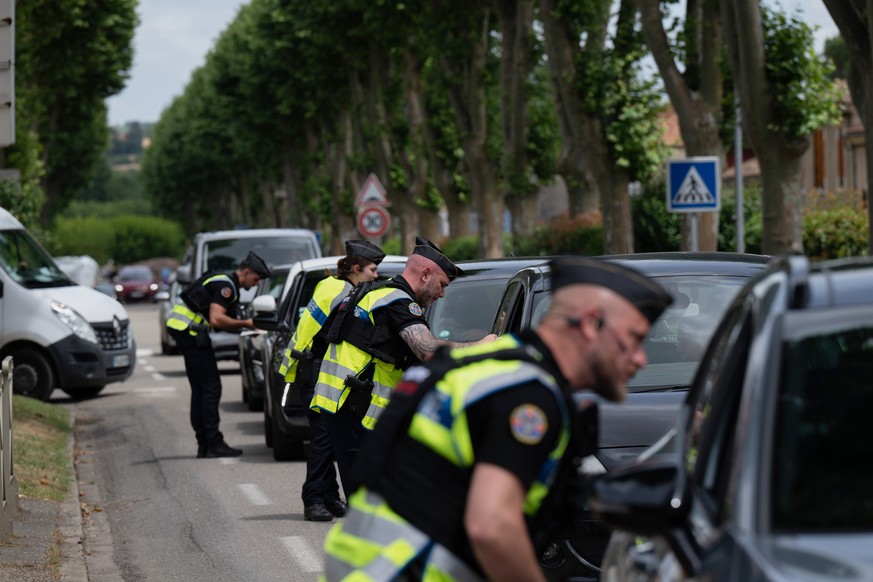 Police inspect vehicles during the search for evidence in the case of missing 11-year-old Lyhanna in Fleurance, southwestern France, Friday June 5, 2026. (AP Photo/Frederic Lancelot)
France Missing Gi ...