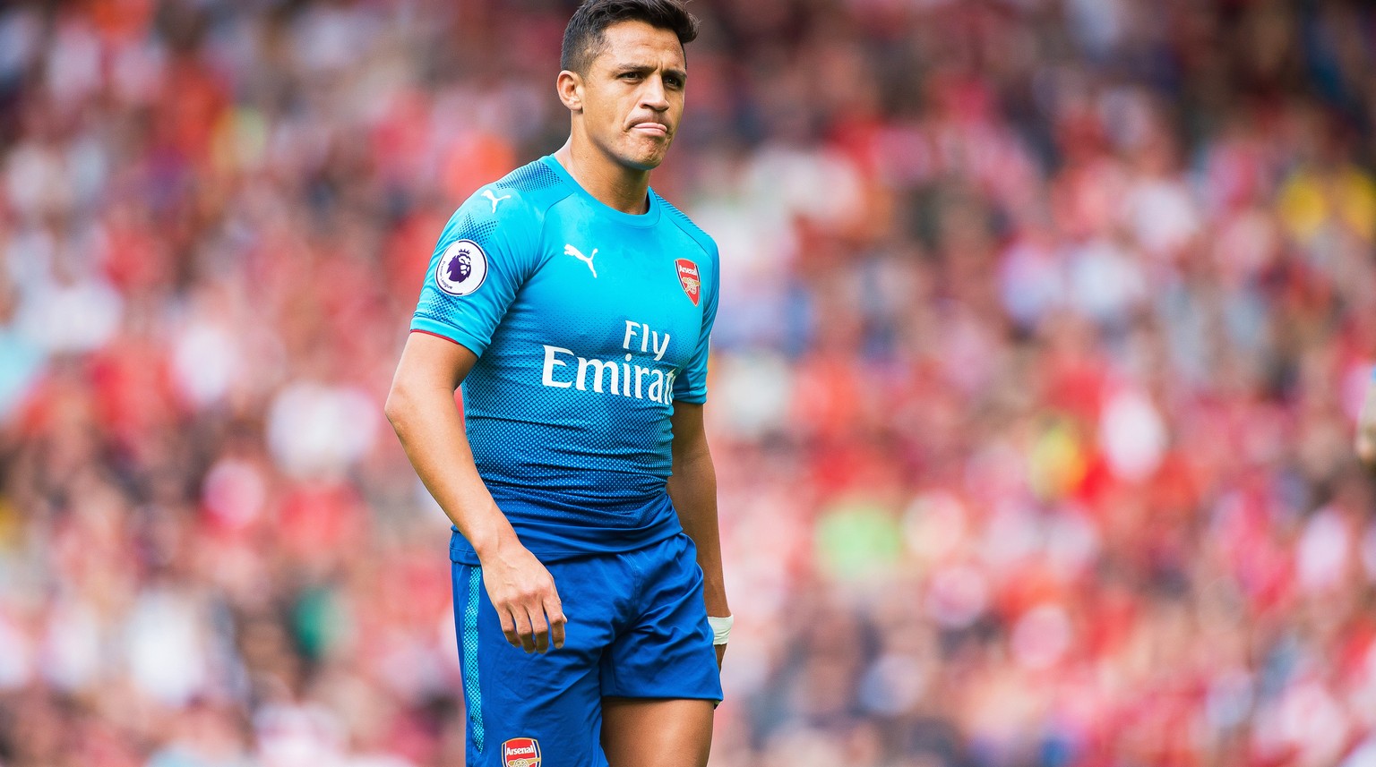 epa06166748 Arsenal&#039;s Alexis Sanchez reacts during the English Premier League soccer match between Liverpool FC and Arsenal FC at Anfield in Liverpool, Britain, 27 August 2017. EPA/PETER POWELL E ...