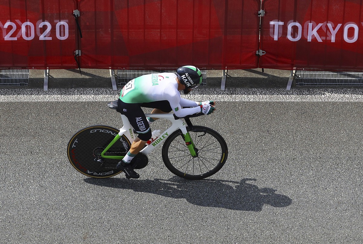Azzedine Lagab of Algeria competes during the men's cycling individual time trial at the 2020 Summer Olympics, Wednesday, July 28, 2021, in Oyama, Japan. (Tim de Waele/Pool Photo via AP)