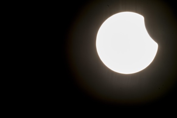 epa04670719 A partial solar eclipse as seen in Zurich, Switzerland, Friday, 20 March 2015. A Partial Solar Eclipse is seen in Europe, northern and eastern Asia and northern and western Africa on 20 Ma ...