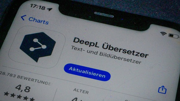 App Store - Apple - Apple App Store auf einem iPhone. Apps Charts Gratis. DeepL