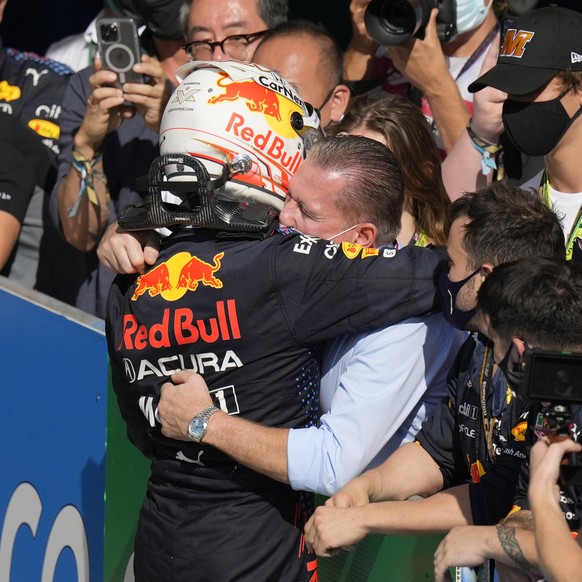 Red Bull driver Max Verstappen, of the Netherlands, hugs his father, Jos Verstappen, after winning the Formula One U.S. Grand Prix auto race at Circuit of the Americas, Sunday, Oct. 24, 2021, in Austi ...