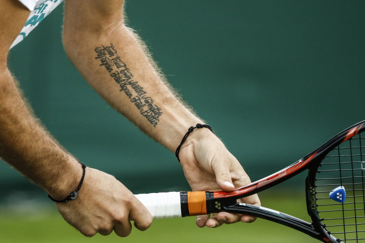 A tattoo seen on the arm of Stan Wawrinka of Switzerland during a training session at the All England Lawn Tennis Championships in Wimbledon, London, Thursday, June 29, 2017. The Wimbledon Championshi ...
