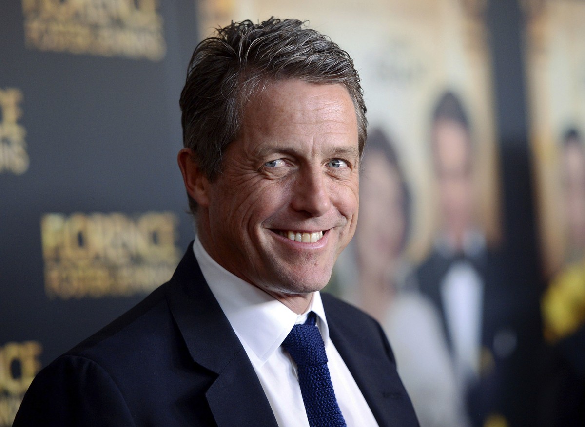 FILE - This Aug. 9, 2016 file photo shows actor Hugh Grant at the premiere of "Florence Foster Jenkins" in New York. Grant will be among several cast members from the 2003 film, "Love A ...