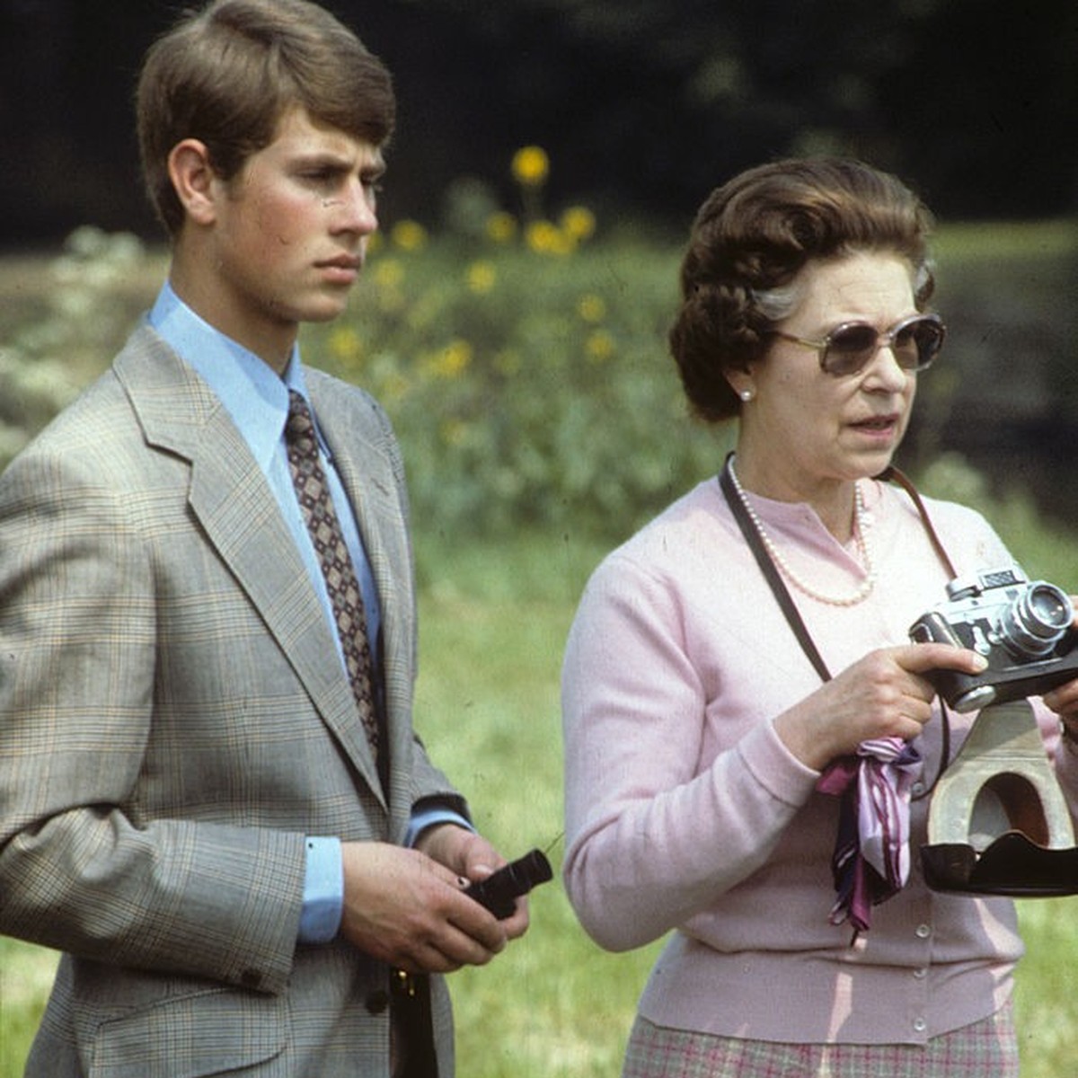 WINDSOR, UNITED KINGDOM - MAY 16 : Queen Elizabeth ll, accompanied by Prince Edward, takes photographs with her camera during Windsor Horse Show on May 16, 1982 in Windsor, England. (Photo by Anwar Hu ...