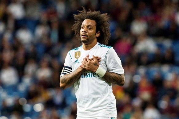 epa06732009 Real Madrid&#039;s Marcelo reacts during the Spanish Primera Division soccer match between Real Madrid and Celta Vigo at Santiago Bernabeu stadium in Madrid, Spain, 12 May 2018. EPA/RODRIG ...