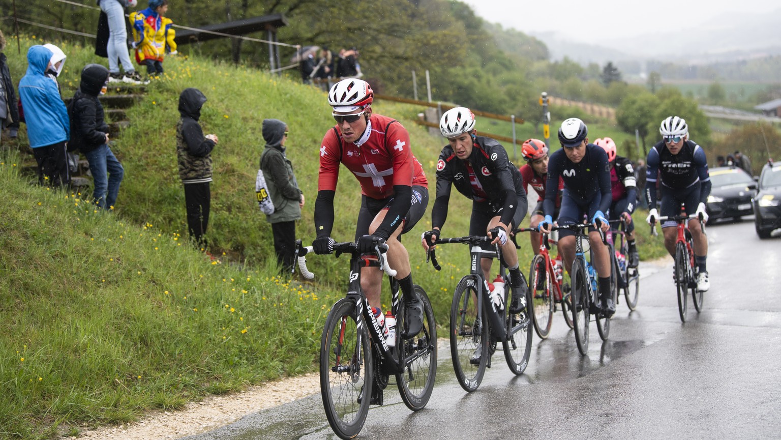 Stefan Kueng from Switzerland of team Groupama-FDJ and Matthias Reutimann from Switzerland of Swiss Cycling National team, from left, in action during the third stage, a 168,7 km race between Estavaye ...