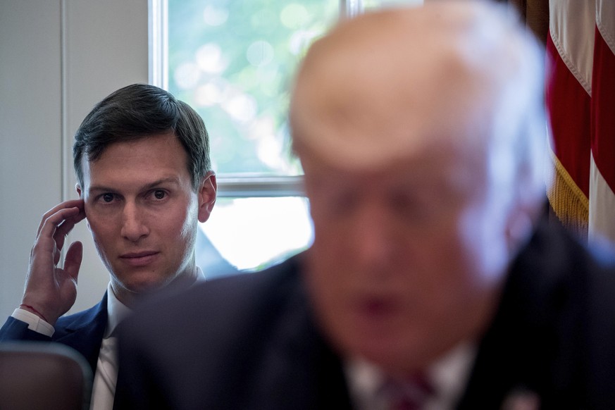 White House Senior Adviser Jared Kushner listens at left as President Donald Trump speaks during a Cabinet meeting, Monday, June 12, 2017, in the Cabinet Room of the White House in Washington. (AP Pho ...