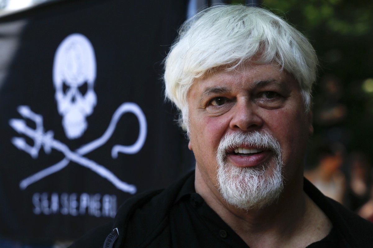 FILE - Paul Watson, then founder and President of the animal rights and environmental Sea Shepherd Conservation, attends a demonstration against the Costa Rican government near Germany's Presiden ...