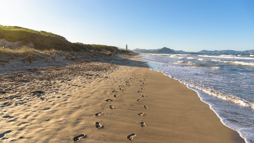 Footprints on the sand on Playa de Muro beach in Majorca Footprints on the sand on Playa de Muro beach in Can Picafort on Majorca. Balearic Islands, Spain, 64904392.jpg RECORD DATE NOT STATED