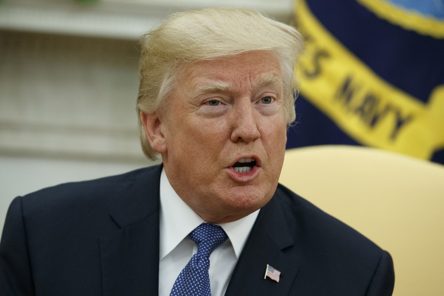 President Donald Trump speaks during a meeting in the Oval Office of the White House, Tuesday, Oct. 10, 2017, in Washington. Senior administration officials have said Trump is expected sign an executi ...