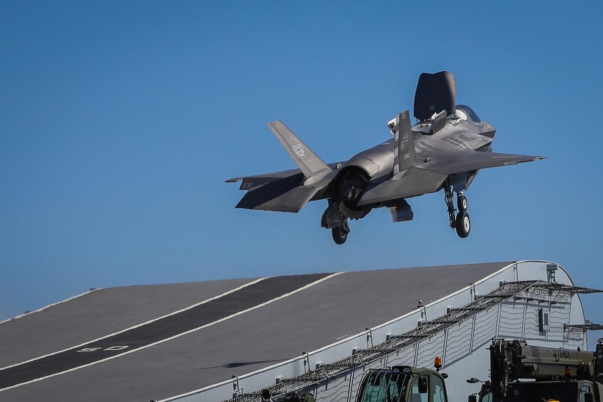 epa07055929 A handout picture provided by the British Ministry of Defence (MOD) showing Royal Navy Commander, Nathan Gray making the first ever F-35B Lightning II jet take off from, the British Royal  ...