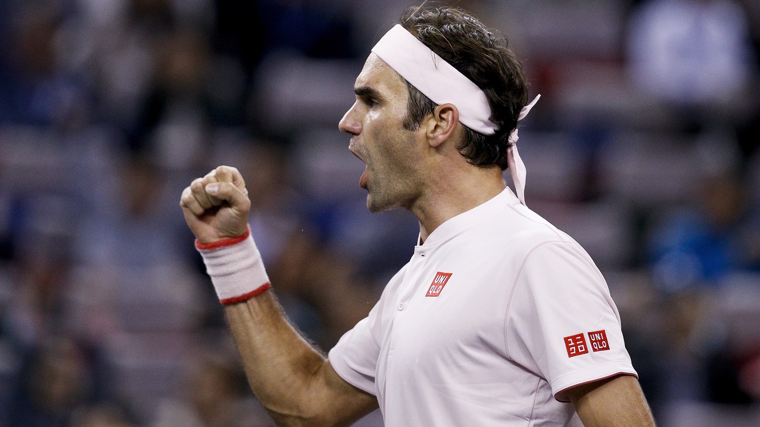 Roger Federer of Switzerland celebrates after defeating Daniil Medvedev of Russia in their men&#039;s singles match of the Shanghai Masters tennis tournament at Qizhong Forest Sports City Tennis Cente ...