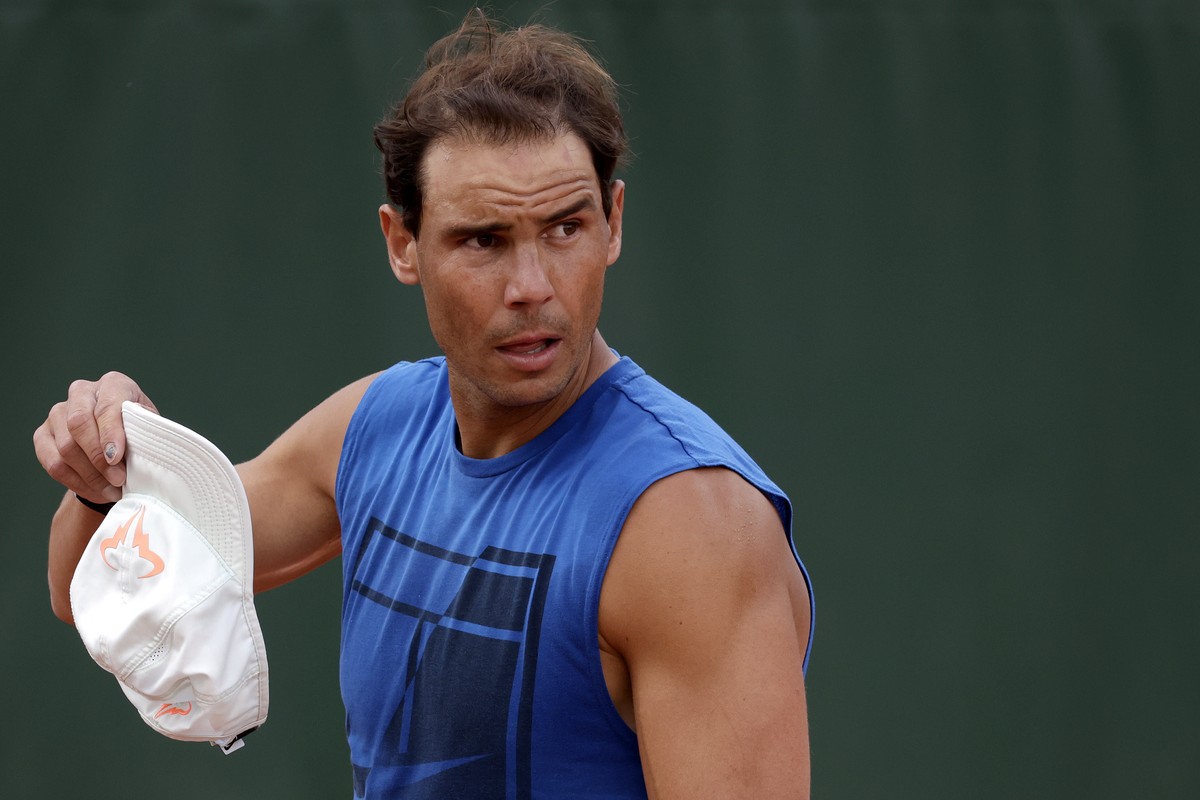 epa09231414 Rafael Nadal of Spain looks on during a practice session ahead of the French Open tennis tournament at Roland ?Garros in Paris, France, 27 May 2021. Roland Garros 2021 will run from 30 May ...