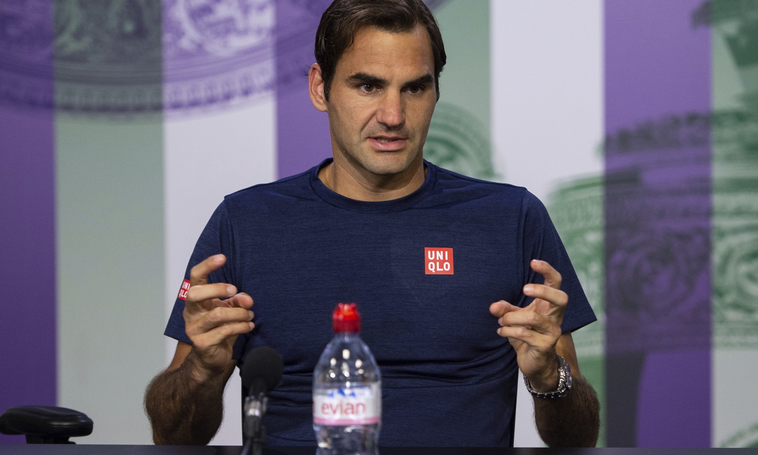 Roger Federer of Switzerland speaks during a press conference after being defeated by Kevin Anderson of South Africa in their men&#039;s singles quarterfinal match at the Wimbledon Tennis Championship ...
