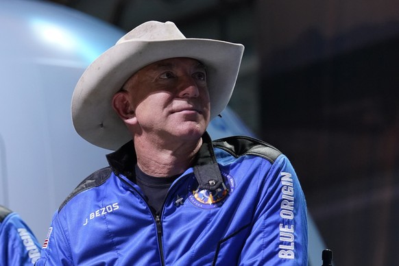FILE - In this July 20, 2021 file photo, Jeff Bezos, founder of Amazon and space tourism company Blue Origin, participates in post launch briefing from its spaceport near Van Horn, Texas. A group of m ...