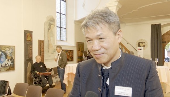Rektor Yiming Li bei der Eröffnungsfeier in der Oberen Kirche am Donnerstag.