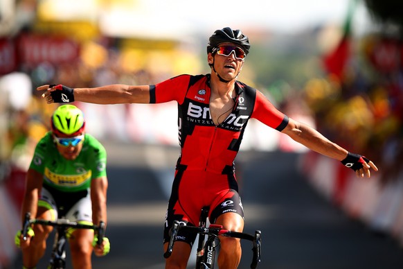 RODEZ, FRANCE - JULY 17: Greg van Avermaet of Belgium and BMC Racing Team celebrates as he crosses the finish line ahead of Peter Sagan of Slovakia and Tinkoff-Saxo during stage thirteen of the 2015 T ...