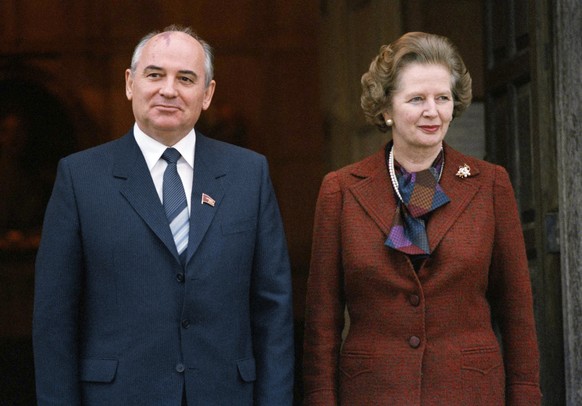 FILE - Soviet leader Mikhail Gorbachev, left, and Britain&#039;s Prime Minister Margaret Thatcher pose for a picture in London, Saturday, Dec. 15, 1984. Russian news agencies are reporting that former ...