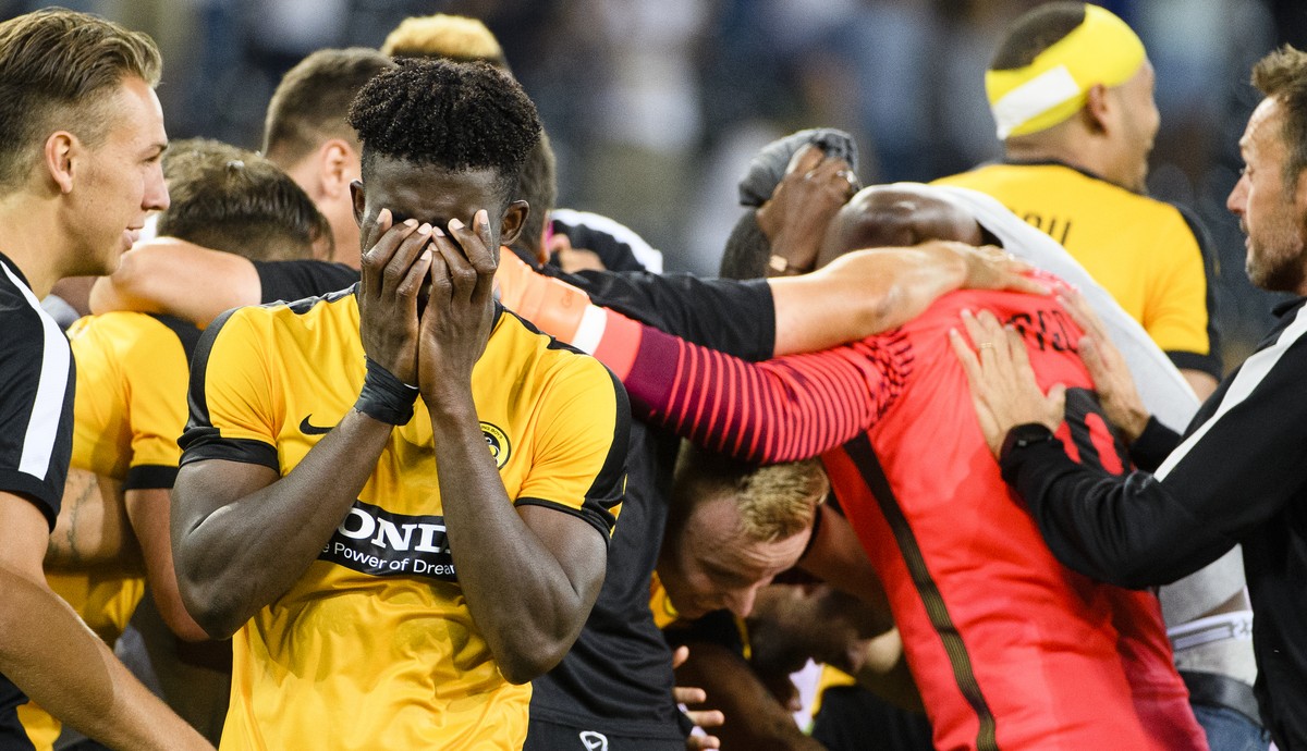 Young Boys' Sekou Sanogo and his team BSC Young Boys celebrate after the penalty shootout at the UEFA Champions League third qualifying round second leg match between Switzerland's BSC Young ...