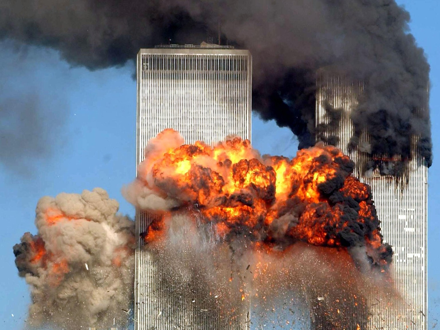 World Trade Center Attacked
NEW YORK - SEPTEMBER 11: Hijacked United Airlines Flight 175 from Boston crashes into the south tower of the World Trade Center and explodes at 9:03 a.m. on September 11, 2 ...