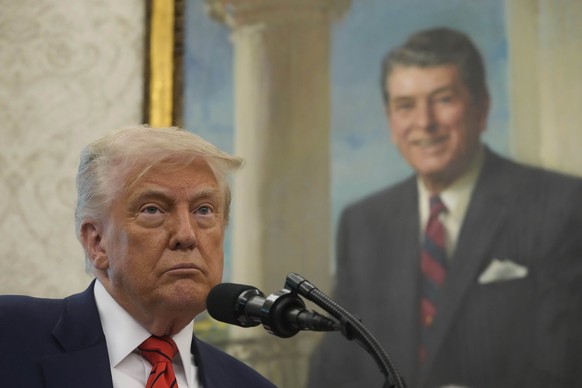 President Donald Trump speaks before Steve Witkoff is sworn as special envoy during a ceremony in the Oval Office of the White House, Tuesday, May 6, 2025, in Washington, with a portrait of former Pre ...