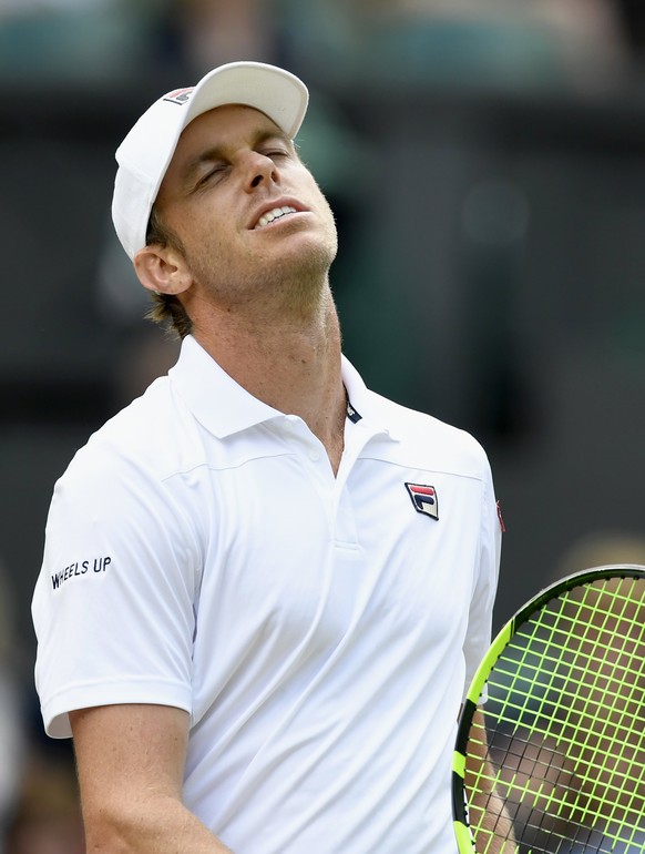 epa06082864 Sam Querrey of the USA in action against Andy Murray of Britain during their quarter final match for the Wimbledon Championships at the All England Lawn Tennis Club, in London, Britain, 12 ...