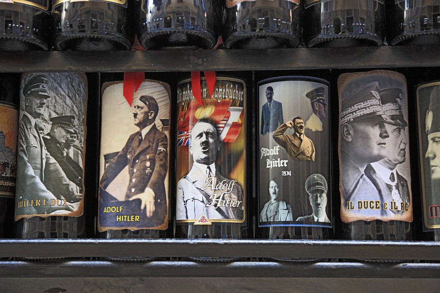 wine bottles with etiquettes of Duce Benito Mussoline and Adolf Hitler _ seen in the display of a wine action in Vernazza, Cinque Terre, Liguria, Italy