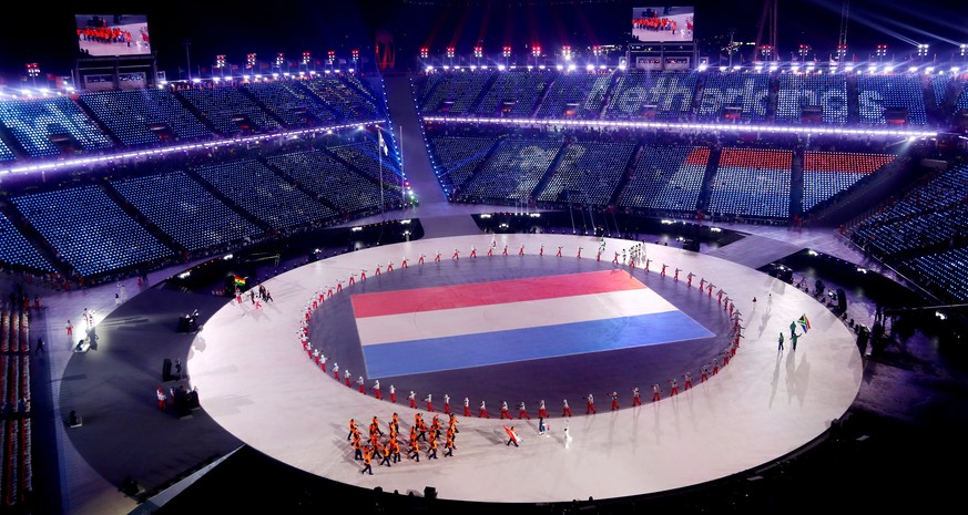 epa06508221 Athletes of The Netherlands arrive during the Opening Ceremony of the PyeongChang 2018 Olympic Games at the Olympic Stadium, Pyeongchang county, South Korea, 09 February 2018. EPA/DIEGO AZ ...