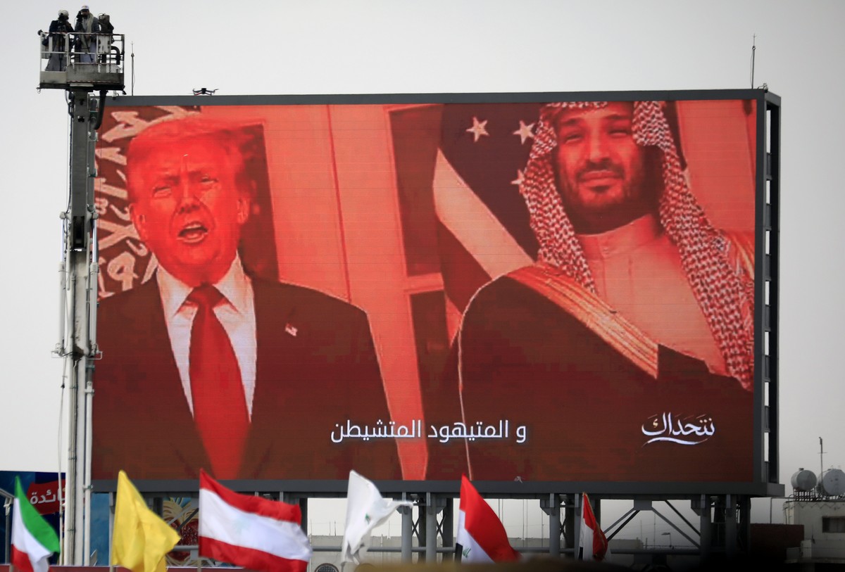 epa13103350 A digital billboard features US President Donald Trump (L) and Saudi Crown Prince Mohammed bin Salman as Houthi supporters stage a protest in solidarity with the Iranian people, and agains ...