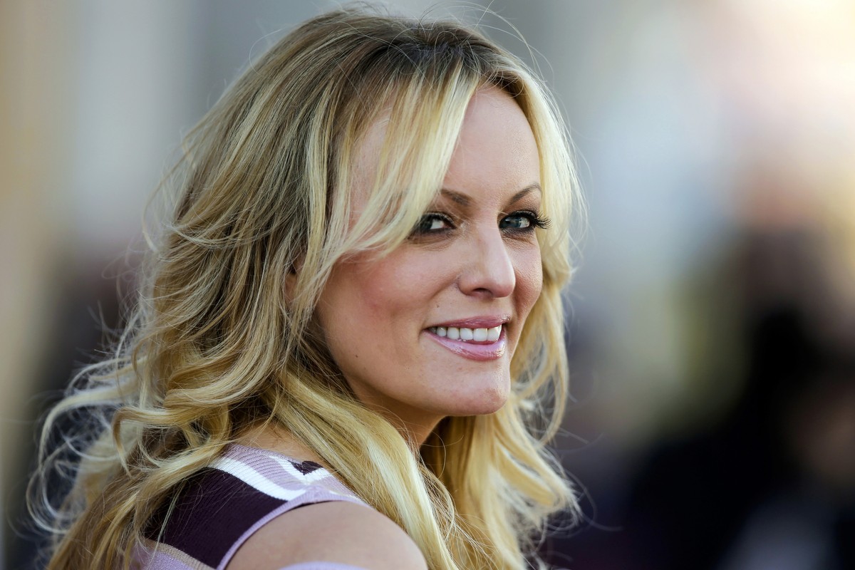 FILE ? Adult film actress Stormy Daniels attends the opening of the adult entertainment fair "Venus," in Berlin, Oct. 11, 2018. (AP Photo/Markus Schreiber, File)
