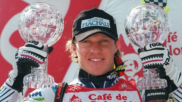 Hermann Maier of Austria holds his two cristal globes, the winner trophies for his victories of the overall men's super-G and giant slalom, in Crans-Montana, Switzerland, on March 14, 1998. (KEYSTONE/ ...
