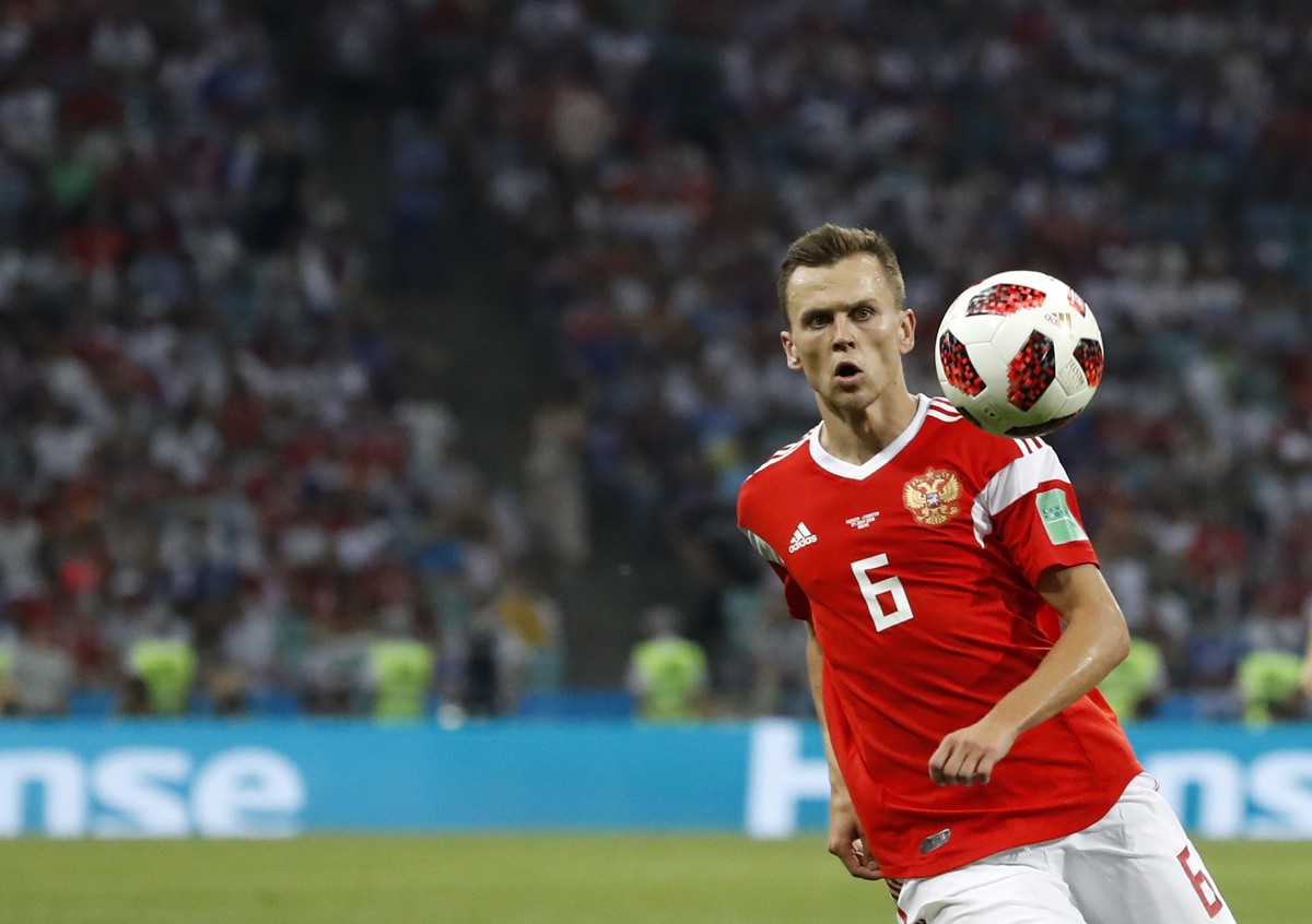 FILE - In this Saturday, July 7, 2018 file photo, Russia's Denis Cheryshev controls the ball during their quarterfinal match against Croatia at the 2018 soccer World Cup in the Fisht Stadium, in  ...