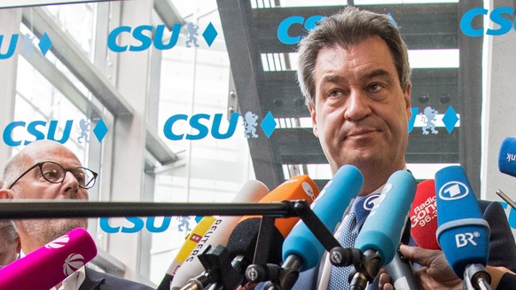 epa06817818 German state Bavaria&#039;s Prime Minister Markus Soeder gives a statement to the media at a Christian Social Union (CSU) party board meeting in Munich, Bavaria, Germany, 16 June 2018. The ...