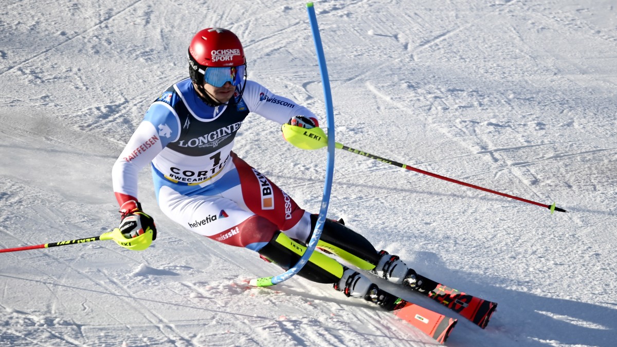 epa09014561 Loic Meillard of Switzerland cuts a gate in the Slalon race of the Men's Combined event at the Alpine Skiing World Championships in Cortina d'Ampezzo, Italy, 15 February 2021. EP ...