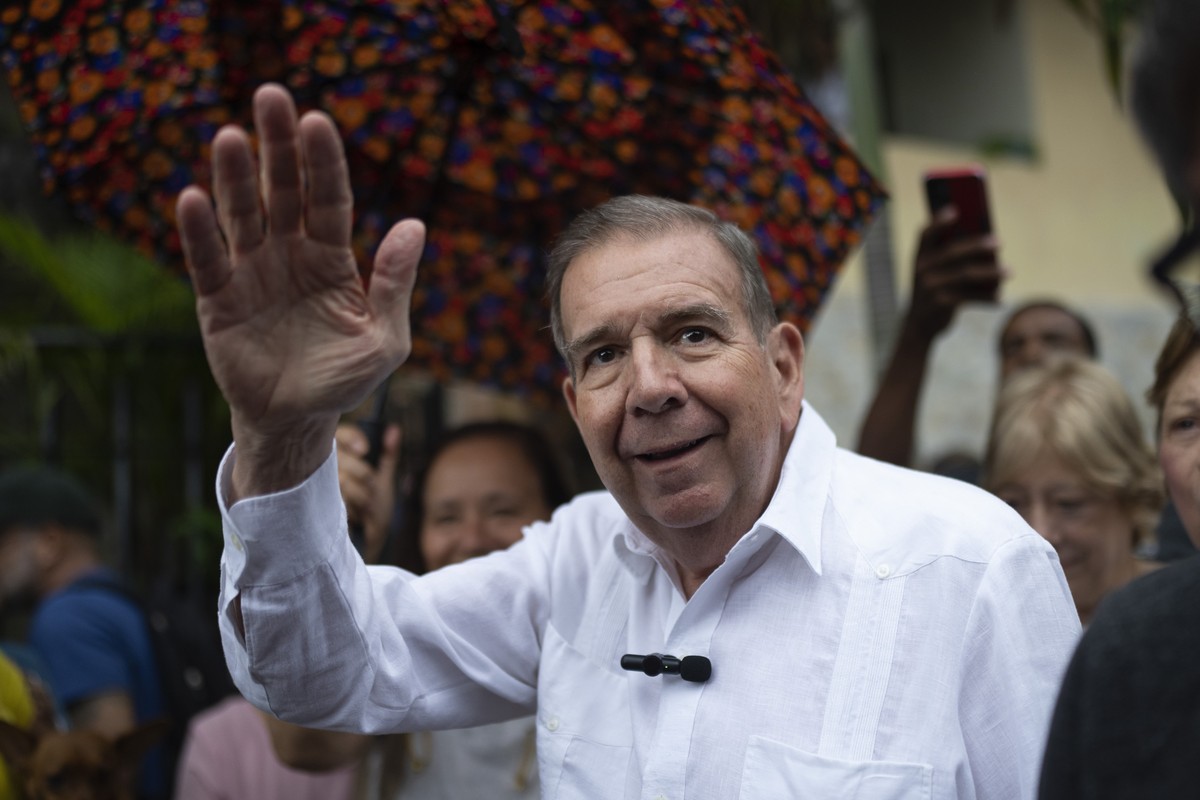 FILE - Venezuelan opposition presidential candidate Edmundo Gonzalez waves to supporters during a political event at a square in the Hatillo municipality of Caracas, Venezuela, June 19, 2024. (AP Phot ...