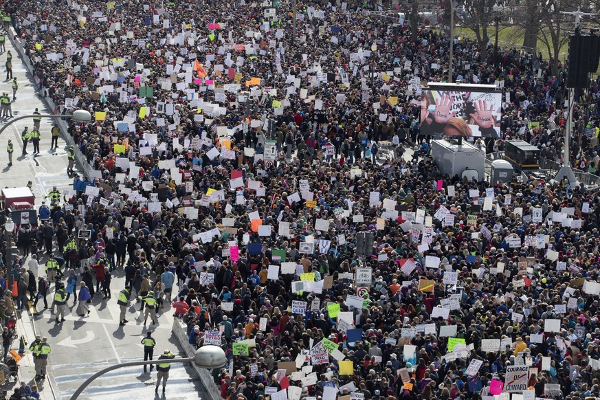 epa06626800 Thousands of people gather for March For Our Lives on Pennsylvania Avenue in Washington, DC, USA, 24 March 2018. March For Our Lives was organized in response to the 14 February shooting a ...