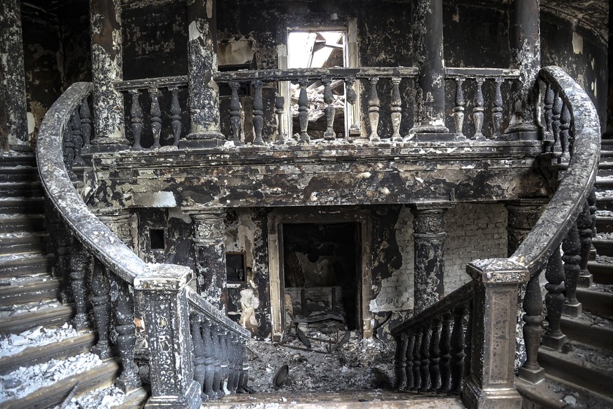FILE - Debris covers the inside of the Donetsk Academic Regional Drama Theatre following a March 16, 2022, bombing in Mariupol, Ukraine, in an area now controlled by Russian forces, April 4, 2022. (AP ...