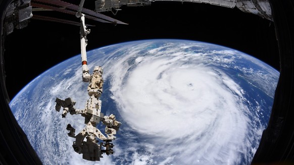 epa09436517 A handout image taken aboard the International Space Station (ISS) and made available by the European Space Agency (ESA) shows Hurricane Ida churning in the Gulf of Mexico ahead of its lan ...