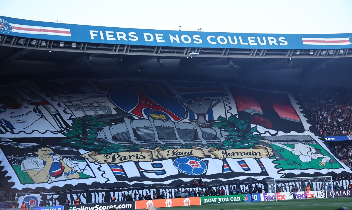 epa12081790 Supporters of PSG display a tifo and as they cheer ahead of the UEFA Champions League semifinal 2nd leg soccer match between Paris Saint-Germain and Arsenal FC, in Paris, France, 07 May 20 ...