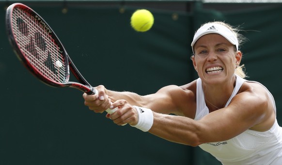 Germany&#039;s Angelique Kerber returns to Shelby Rogers of the United States during their Women&#039;s Singles Match on day six at the Wimbledon Tennis Championships in London Saturday, July 8, 2017. ...