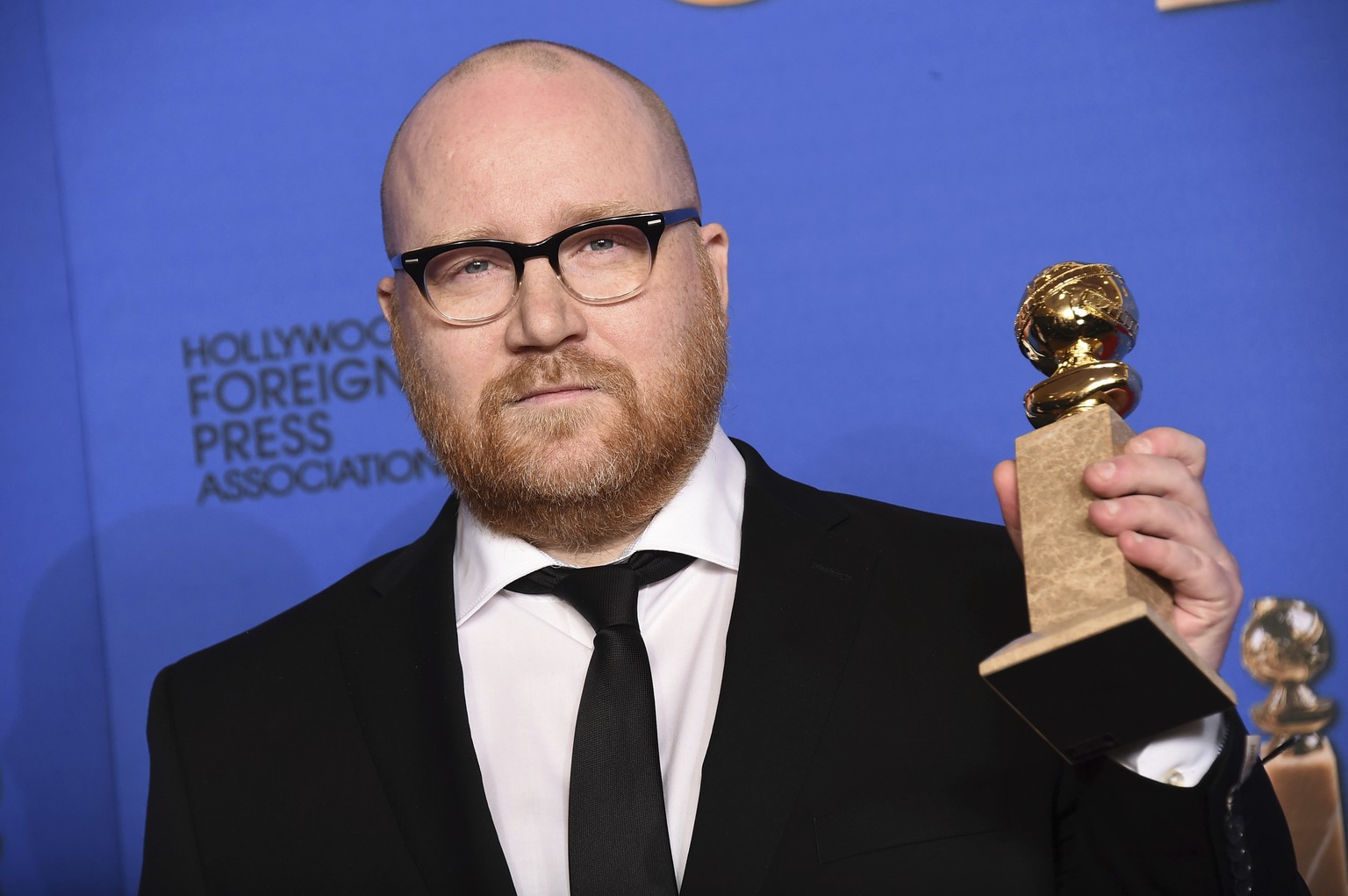 FILE - In this Jan. 11, 2015 file photo, Johann Johannsson poses in the press room with the award for best original score for &quot;The Theory of Everything&quot; at the 72nd annual Golden Globe Award ...