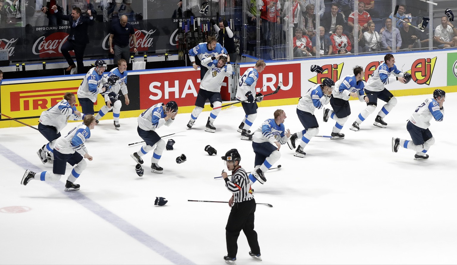 Finland players celebrate after beating Canada 3-1 in the Ice Hockey World Championships gold medal match at the Ondrej Nepela Arena in Bratislava, Slovakia, Sunday, May 26, 2019. (AP Photo/Petr David ...