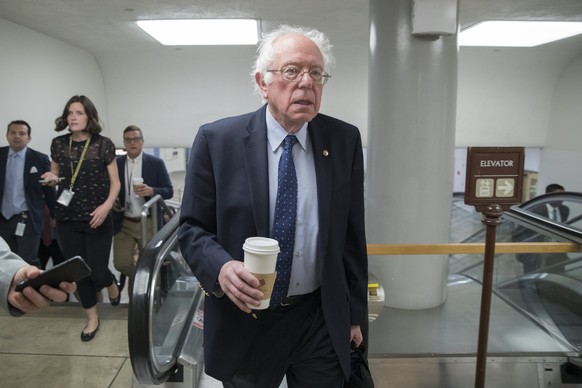 epa05955280 Independent Senator from Vermont Bernie Sanders walks to the Senate chamber before a vote on Capitol Hill in Washington, DC, USA, 10 May 2017. The Senate convenes the day after US Presiden ...