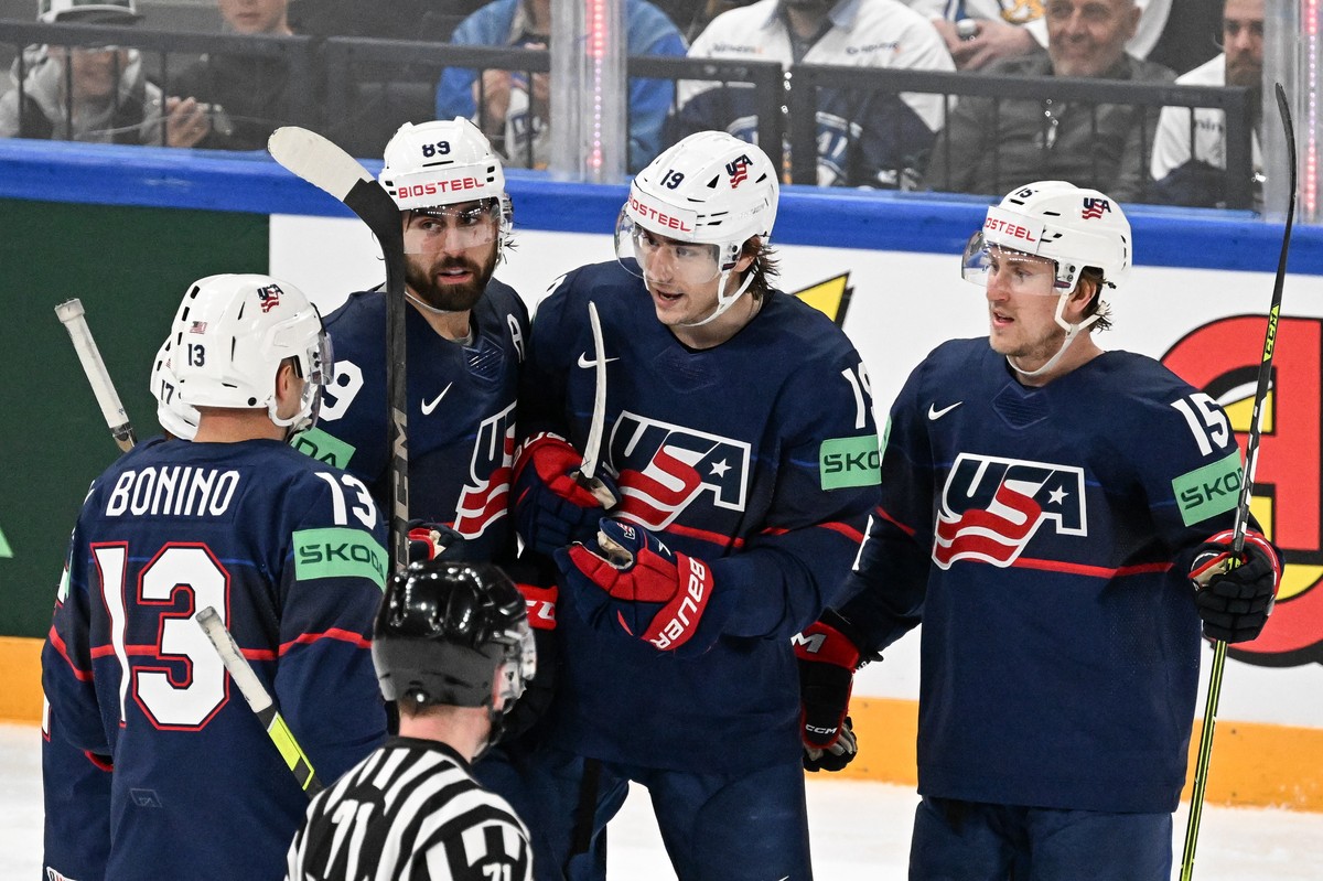 epa10640458 Cutter Gauthier (2R) from USA celebrates a goal during the IIHF 2023 Ice Hockey World Championship group A match between USA and Denmark in Tampere, Finland, 20 May 2023. EPA/KIMMO BRANDT