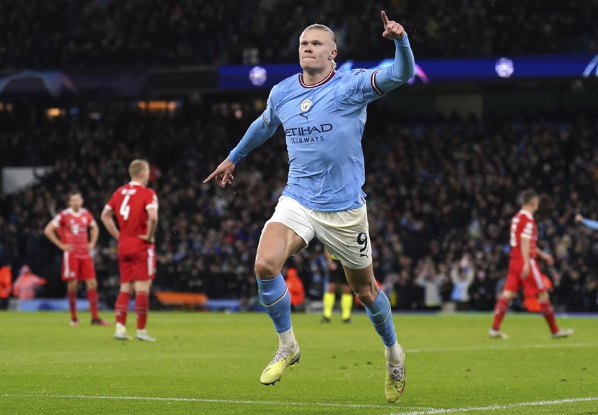 Manchester City&#039;s Erling Haaland celebrates after scoring his side&#039;s third goal during the Champions League quarterfinal, first leg, soccer match between Manchester City and Bayern Munich at ...